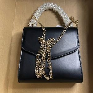 Aurora Imitation Pearl
Faux Leather Handbag Topshop